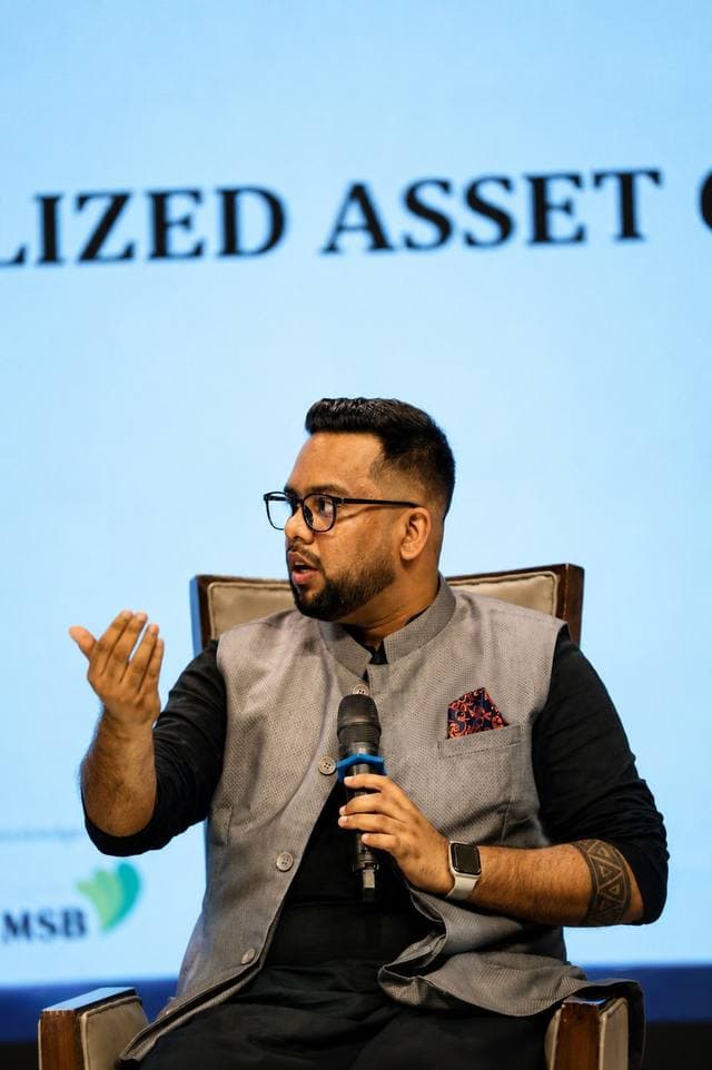 Joshua Prottoy Adhikari speaking at an industry panel